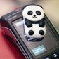 walkie panda posé sur un terminal de paiement